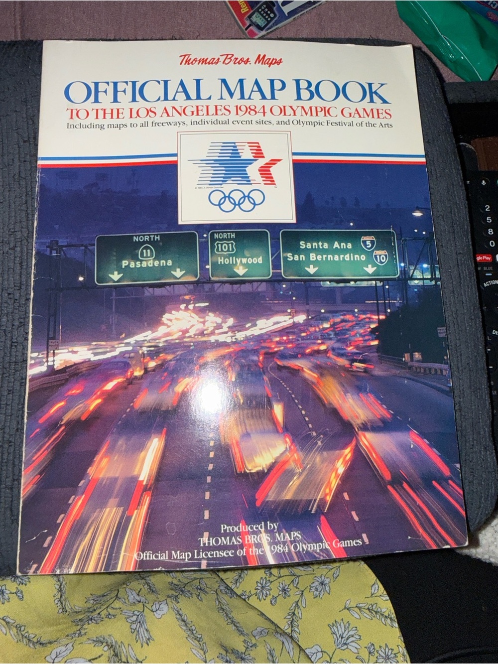 Source Unknown Official Map Book - White & Blue Cover with Red Accents